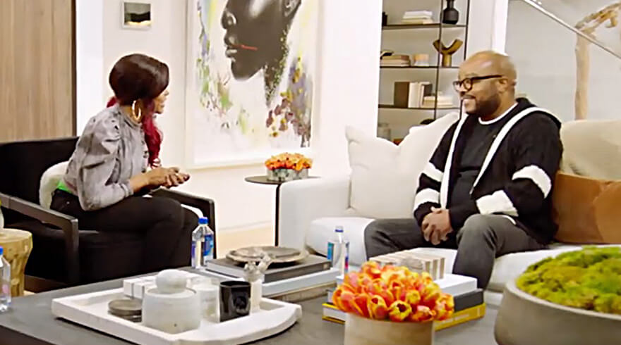 Taraji P. Henson and Dr. Michael A. Lindsy sitting on a couch together in a studio