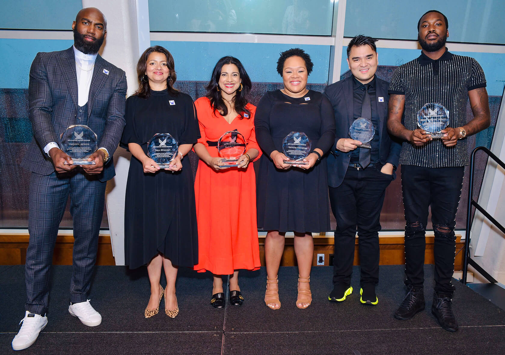 Photo of Honorees holding their awards at the 2019 Awards ceremony