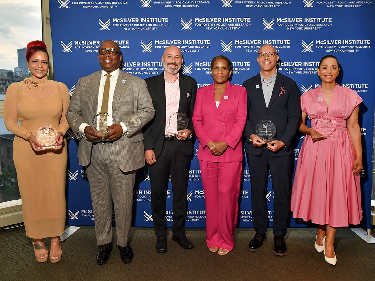 Photo of 5 of the honorees standing with Rose Pierre-Louis