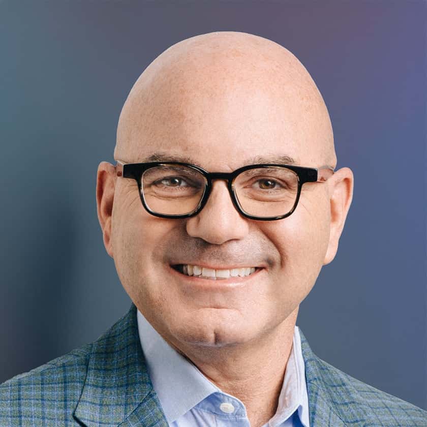 Smiling headshot of Richer