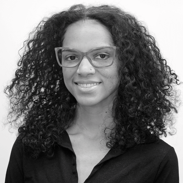 Black and white photo of Leguillow smiling