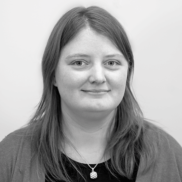 Black-and-white portrait of Ms. Baker